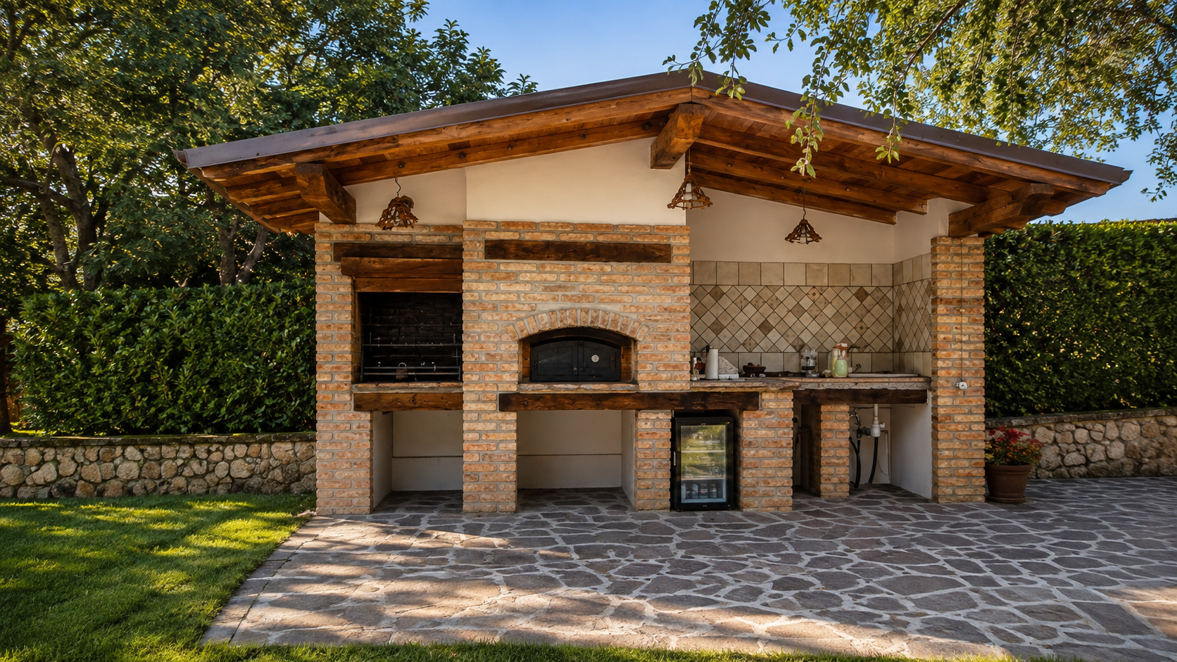 Struttura esterna in muratura con barbecue e forno in fase di realizzazione